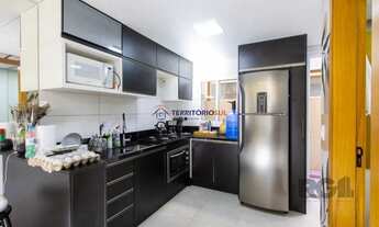 Imagem 6: Casa em condomínio, possui 2 dormitórios, sala para 2 ambientes e 1 vaga