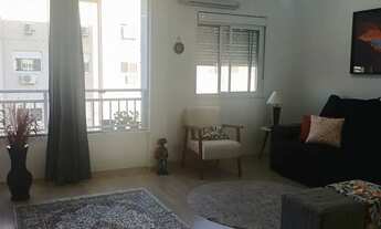 Imagem 4: Apartamento de 3 dormitórios com living estendido, semi mobiliado, suíte e churrasqueira