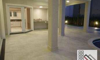 Imagem 5: CASA EM CONDOMÍNIO 4 DORMITÓRIOS (440m²), 4 SUITES, SEMI MOBILIADA, 8 VAGAS DE GARAGEM