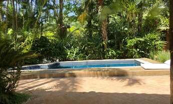 Imagem 3: Casa com 4 suítes, piscina privativa e jacuzzi em condomínio na praia da Baleia. Locação M