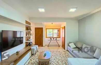 Imagem 6: Casa em Porto Alegre, no bairro Guarujá, com 3 dormitório(s), e 3 banheiros, à v