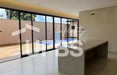 Imagem 5: Casa à venda no Setor Garavelo 3 suítes, área gourmet e piscina aquecida, próxima ao Jard