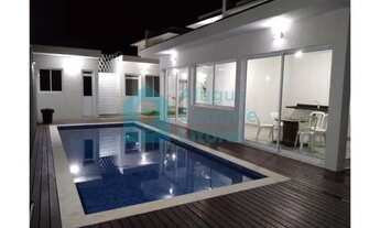 Imagem 4: Casa de condomínio a poucos metros da praia, com 2 suítes e piscina, em Boiçucanga