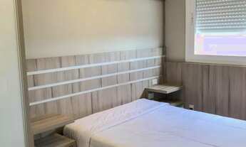 Imagem 6: MOBILIADO E EQUIPADO. 2 quartos (1 suíte), churrasqueira, sacada e vista. Infra estrutura