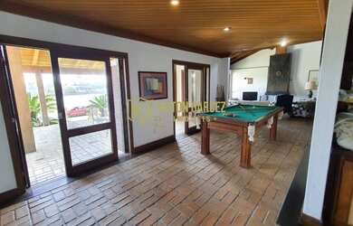 Imagem 7: Linda casa com 4 suítes e piscina na beira rio em Torres