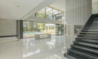 Imagem 7: CASA EM CONDOMÍNIO COM 5 SUÍTES, PISCINA AQUECIDA E AMPLO JARDIM Casa em condomínio com 5