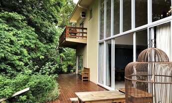 Imagem 3: São 3.240m² de muita natureza, privacidade, estilo e conforto com fino acabamento! Venha c