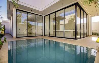 Imagem 2: Alphaville Uberlândia - Casa de condomínio térrea para venda com 4 suítes e piscina