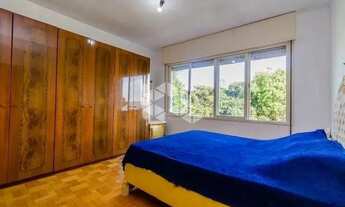 Imagem 6: Casa, no andar térreo, living, 3 dormitórios, sendo uma suíte, banheiro social com hidroma