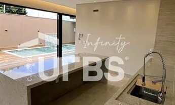 Imagem 7: Casa à venda no Setor Garavelo 3 suítes, área gourmet e piscina aquecida, próxima ao Jard