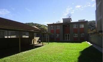 Imagem 2: Terreno com prédio com 4 apartamentos de 2 quartos