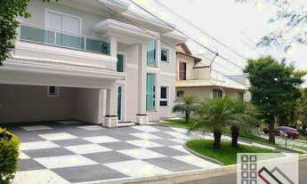 Imagem 3: CASA EM CONDOMÍNIO 4 DORMITÓRIOS (440m²), 4 SUITES, SEMI MOBILIADA, 8 VAGAS DE GARAGEM