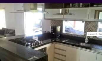 Imagem 2: Casa de condomínio térrea para venda tem 125 metros quadrados com 3 quartos