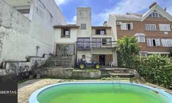 Imagem 2: Casa em Porto Alegre, no bairro Ipanema, com 3 dormitório(s), à venda