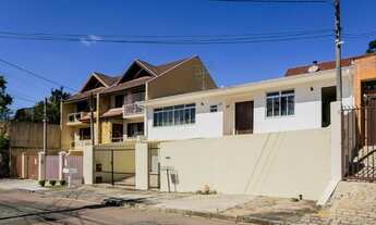 Imagem 3: Casa de 211m² com 3 quartos em rua calma no Pilarzinho