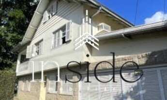 Imagem 2: Casa para venda com 325 metros quadrados com 8 quartos em Hugo Lange - Curitiba - PR