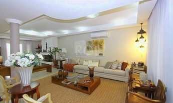 Imagem 3: EXCELENTE CASA COM 4 DORMITÓRIOS, 6 VAGAS DE GARAGEM E VISTA PANORÂMICA