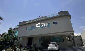 Imagem 2: Luxuosa Casa Triplex com 4 Suítes, Piscina e Área Gourmet em Condomínio Fechado