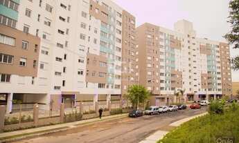 Imagem 3: Apartamento desocupado de dois dormitórios, churrasqueira e uma vaga na garagem no bairro