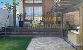 Imagem 5: Casa de condomínio para venda possui 300 metros quadrados com 4 quartos