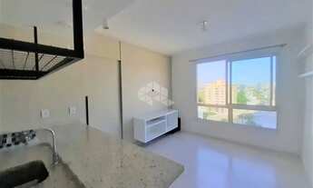 Imagem 4: APARTAMENTO DESOCUPADO E SEMI-MOBILIADO À VENDA NO PARIGI, COM 1 DORMITÓRIO, CHURRASQUEIRA