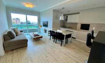 Imagem 2: Apartamento com 1 dormitório para alugar, 57 m² por R$ 3.300,00/mês - Três Figueiras - Por