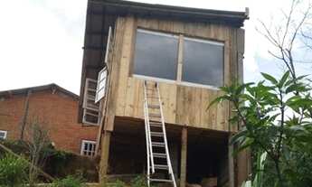 Imagem 5: Terreno com casa de tijolo ecológico