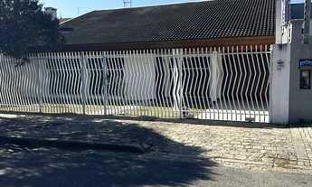 Imagem 7: Linda casa com 393 m2 úteis, 5 dormitórios, sendo 2 suítes, no Jardim Social/Curitiba