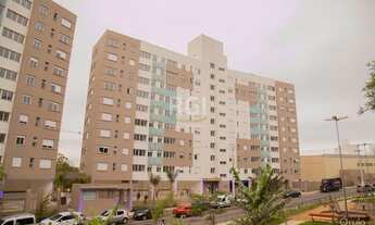 Imagem 2: Apartamento desocupado de dois dormitórios, churrasqueira e uma vaga na garagem no bairro