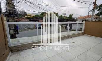 Imagem 2: Sobrado com 2 dormitórios no piso superior, salão comercial no piso inferior, garagem para