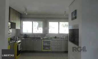 Imagem 7: Casa em Porto Alegre, no bairro Espirito Santo, com 3 dormitório(s), e 3 banheir