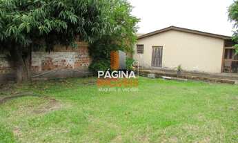 Imagem 2: Página 1 Imóveis anuncia Terreno de esquina com casa de 3 dormitórios, para venda no bairr