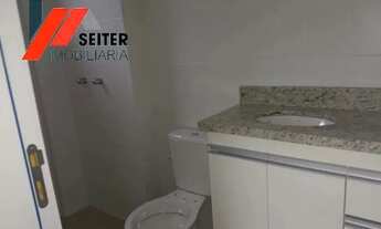 Imagem 7: Apartamento de 2 dormitórios com suite semi mobiliado e sacada com churrasqueira