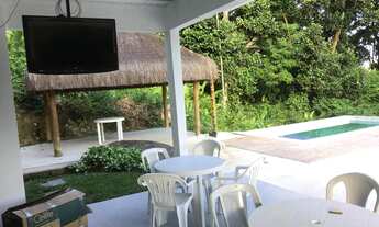 Imagem 3: Casa de praia com piscina em condomínio fechado com 3 quartos e área ampla de lazer