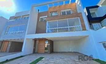 Imagem 2: Casa Condominio em Porto Alegre, no bairro Hípica, com 3 dormitório(s), e 3 banh