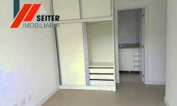 Imagem 5: Apartamento de 2 dormitórios com suite semi mobiliado e sacada com churrasqueira