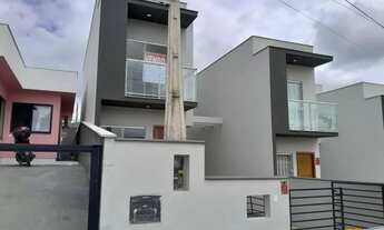 Imagem 2: Sobrado Não Geminado com 2 suítes e vaga de garagem em Potecas, São José