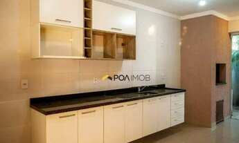 Imagem 3: Casa com 3 dormitórios para alugar, 170 m² por R$ 4.181,00/mês - Guarujá - Porto Alegre/RS