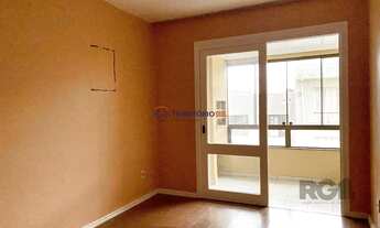 Imagem: Apartamento com sacada, churrasqueira e