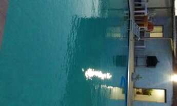 Imagem 6: Clube de piscina com casa