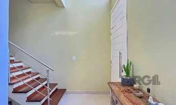 Imagem 5: Casa em Porto Alegre, no bairro Hípica, com 3 dormitório(s), e 3 banheiros, à venda