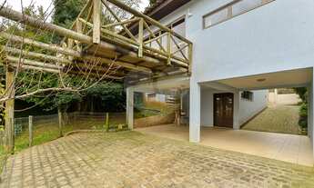 Imagem 4: Casa para venda possui 300 metros quadrados com 4 quartos em Mossunguê - Curitiba - PR