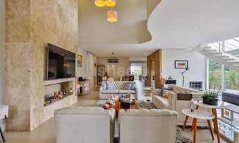 Imagem 3: Casa de condomínio para aluguel possui 460 metros quadrados com 5 quartos