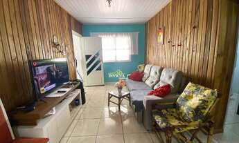 Imagem 6: Casa de madeira a beira mar Balneário Riviera