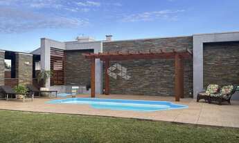 Imagem 6: Casa semimobiliada, Piscina aquecida, Deck, Pergolado com 5 Dormitórios, sendo 1 suíte e P