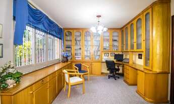 Imagem 6: Casa de 289m² - 3 dormitórios, 1 suíte, 4 salas, churrasqueira, pátio e 4 vagas de garagem