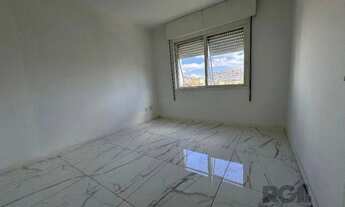 Imagem 3: Apartamento com 54,70 m² de área privativa com dois dormitórios, sala, cozinha e área de s