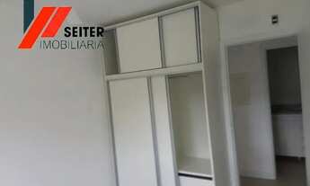 Imagem 6: Apartamento de 2 dormitórios com suite semi mobiliado e sacada com churrasqueira