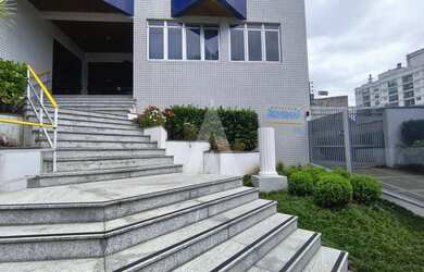 Imagem 3: Apartamento residencial com 3 quartos, sendo um deles suite, cozinha com armários e sacada