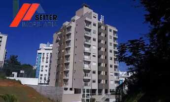 Imagem 4: Apartamento de 2 dormitórios com suite semi mobiliado e sacada com churrasqueira